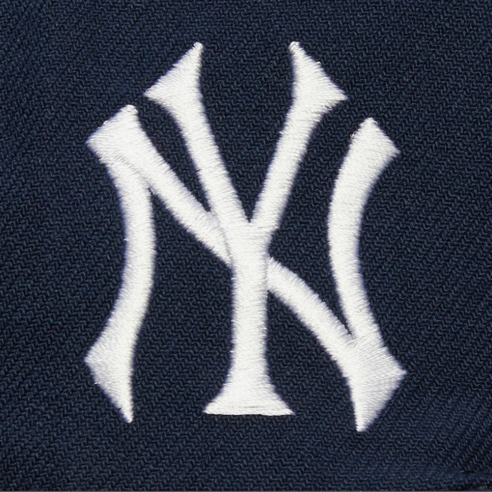 Navy New York Yankees Mitchell & Ness Team Tagged Snapback Hat
